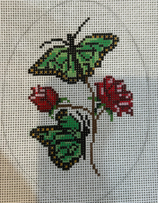 Green and Bold Butterflies on Roses