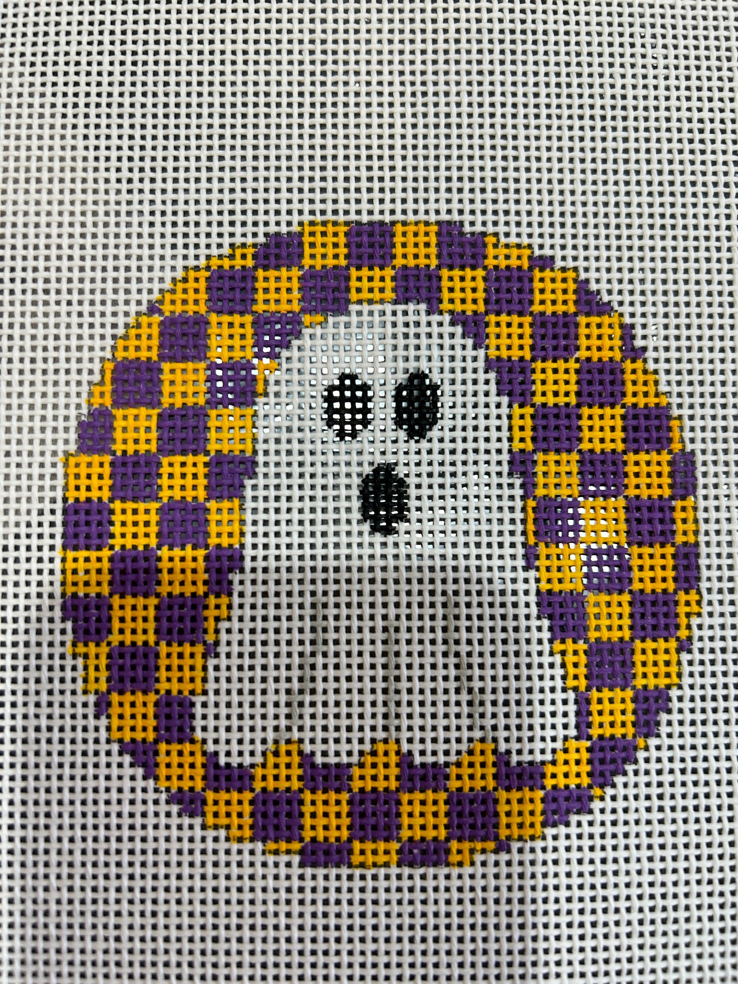 Ghost on purple and orange checks