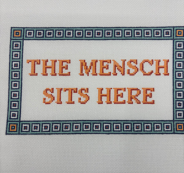 The Mensch Sits Here