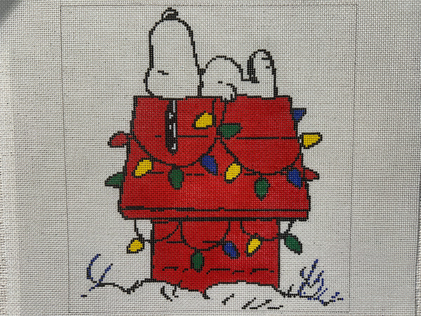 Snoopy on Lit Doghouse